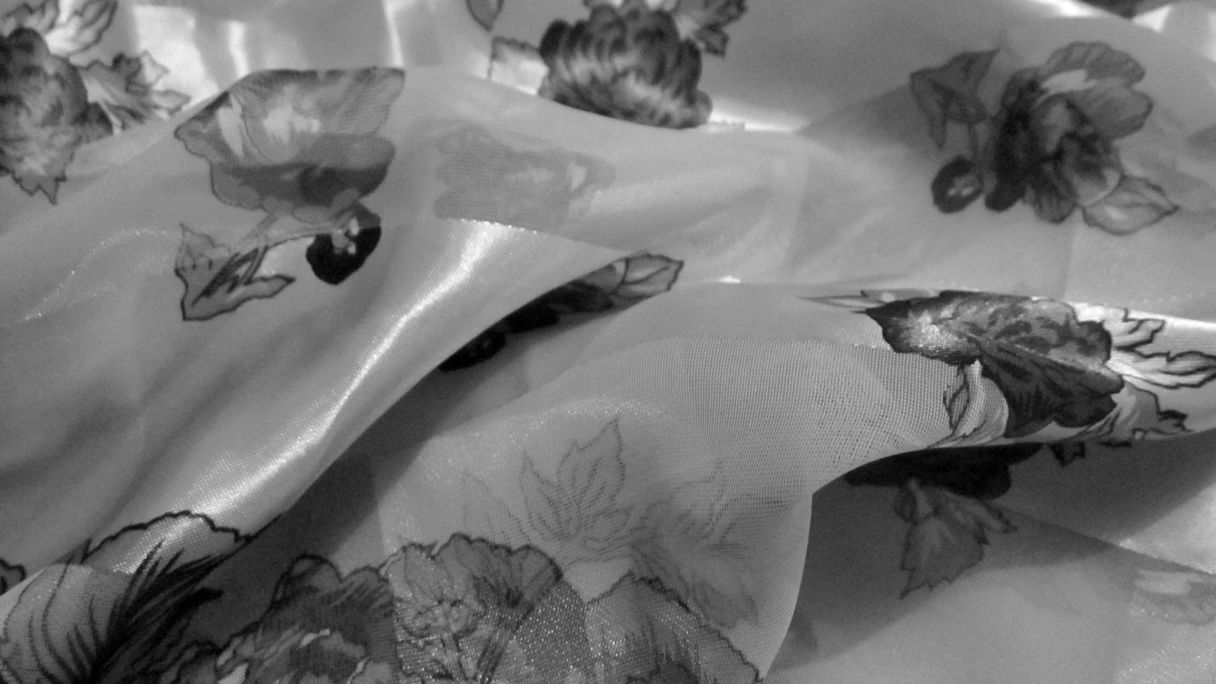 Folds of a printed silk scarf